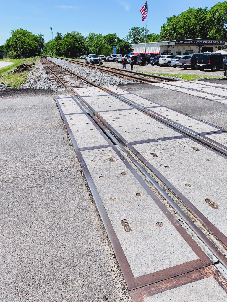 Railroad tracks in New Waverly, TX 
acrossthelake.blog
