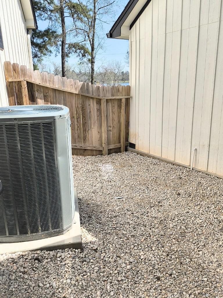 After photo:  AC area in back yard.  acrossthelake.blog