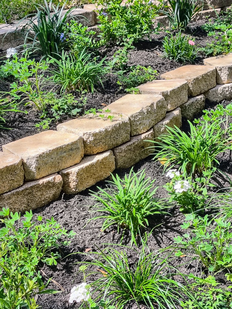 Royalview's tiered backyard garden.  acrossthelake.blog