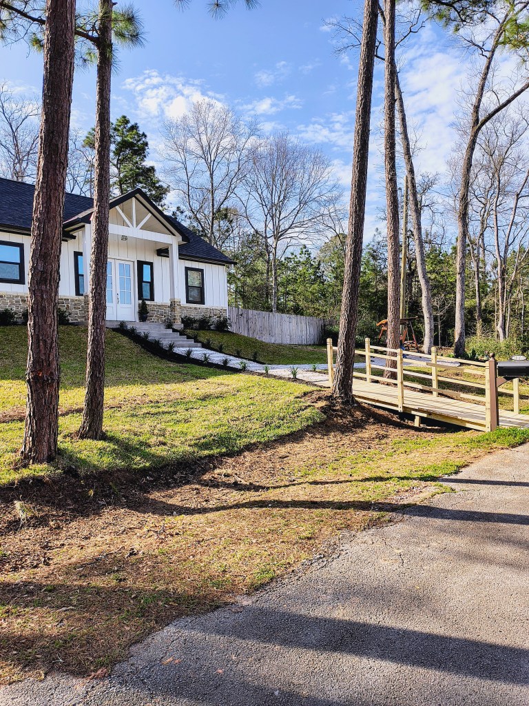 Custom build landscape bridge by Eagle A Improvments, Houston, TX acrossthelake.blog