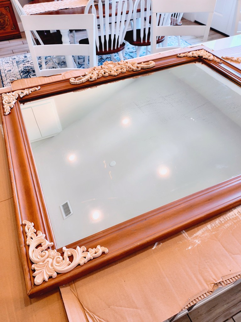 Ornamental decorative wood appliques onlays for vintage mirror makeover project. Easy to paint and apply to wood project. From Amazon. https://amzn.to/3FQvNl7
acrossthelake.blog