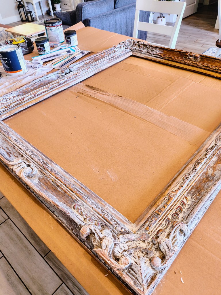 DIY White wash paint project:  old salvaged wooden frame.
acrossthelake.blog