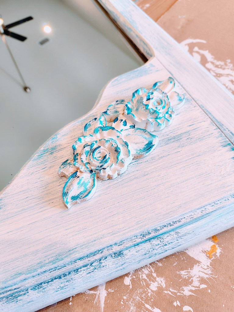 Wooden rose applique from Amazon, painted in white and blue.
https://amzn.to/3GzUfr4
acrossthelake.blog