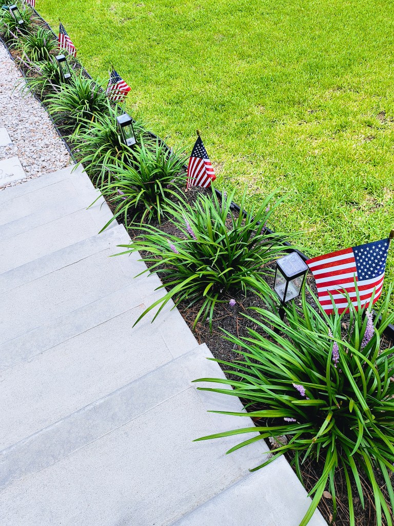American Flags along our front walkway at Royalview.
acrossthelake.blog