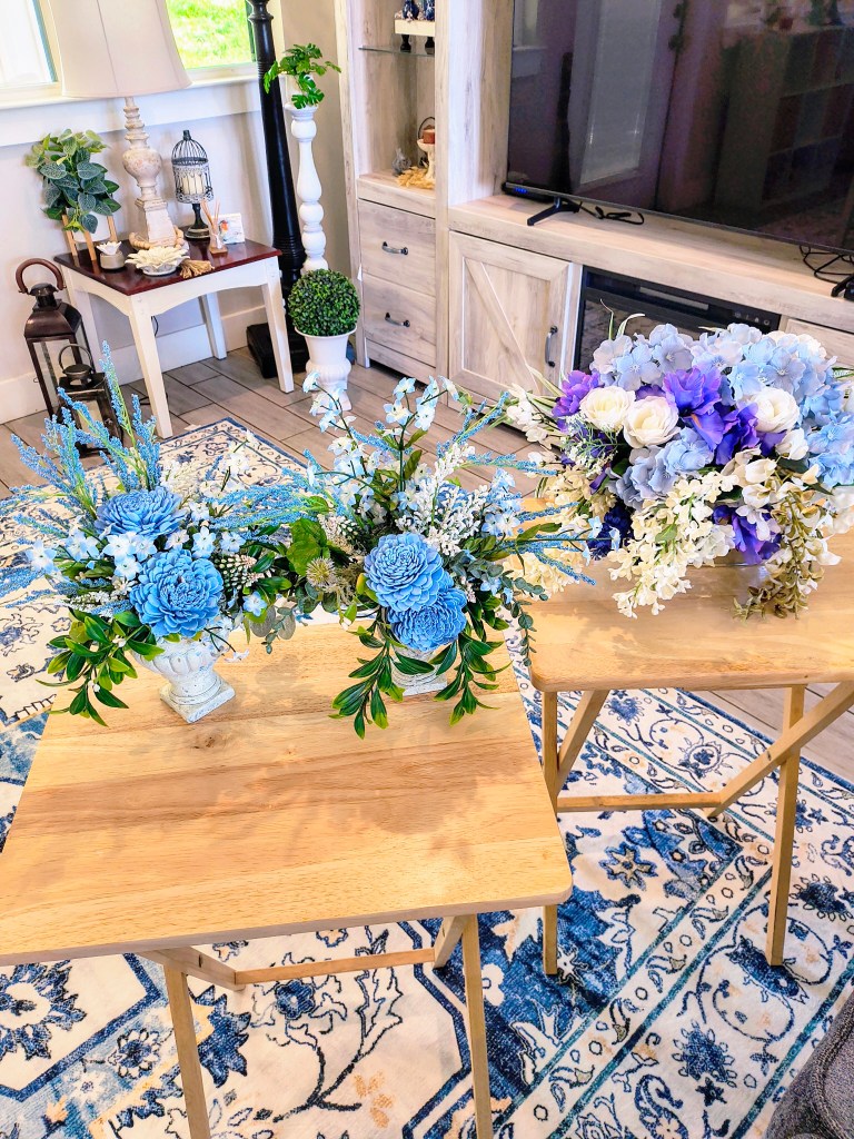 Blue, white, and purple faux floral arrangements to be transformed into Fall arrangements.
acrossthelake.blog
