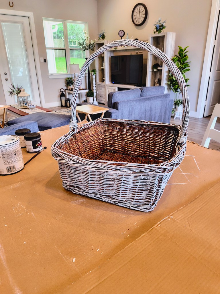 Wicker basket painted white.
acrossthelake.blog