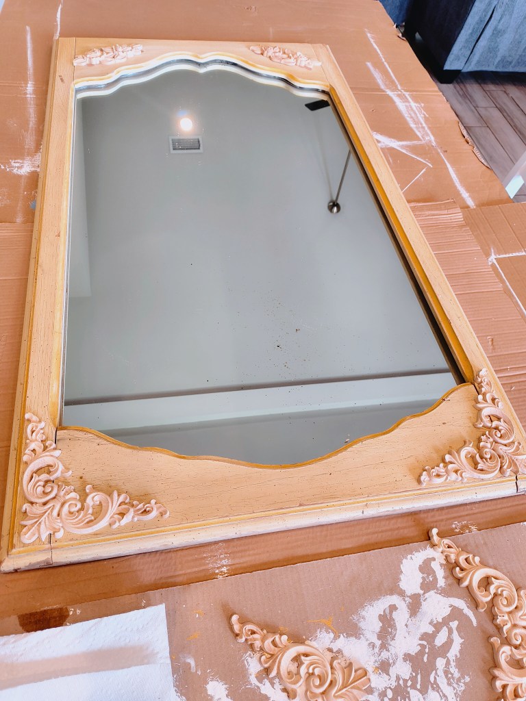 Vintage mirror makeover, testing placement of wooden appliques.
Appliques from Amazon.
https://amzn.to/44nSFlu
acrossthelake.blog