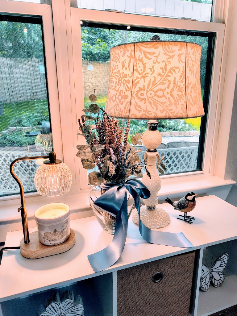 Beautiful vintage style cream colored glass lamp pictured lit from Mimi's on Main, Conroe, TX.
acrossthelake.blog