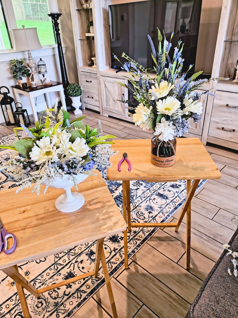 Two faux floral arrangements in white, blue and purple.
acrossthelake.blog