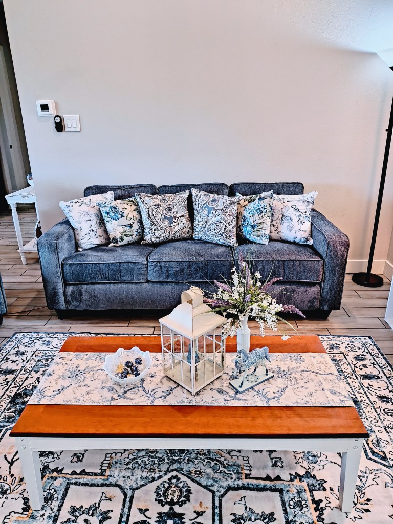 Bare living room wall awaiting decor.
acrossthelake.blog