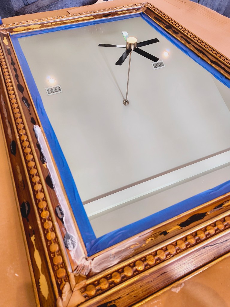 Western Motif Vintage Mirror Before Painting, with Blue Painters Tape.
acrossthelake.blog