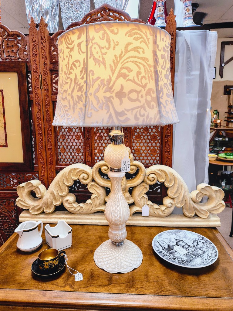 Beautiful vintage cream colored glass lamp found at Mimi's on Main, Conroe, Texas.
acrossthelake.blog