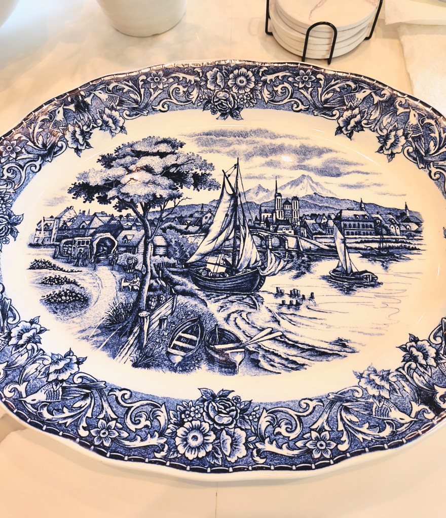 Vintage blue and white platter with village lake and boats theme.
acrossthelake.blog