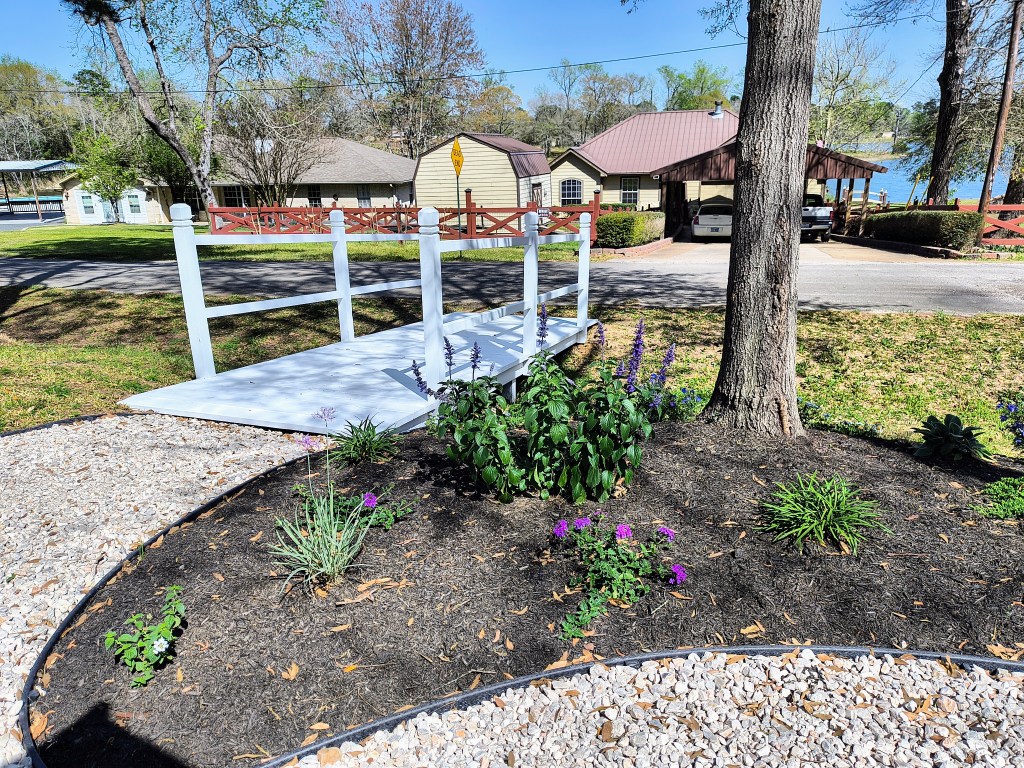 Garden bridge from acrossthelake.blog