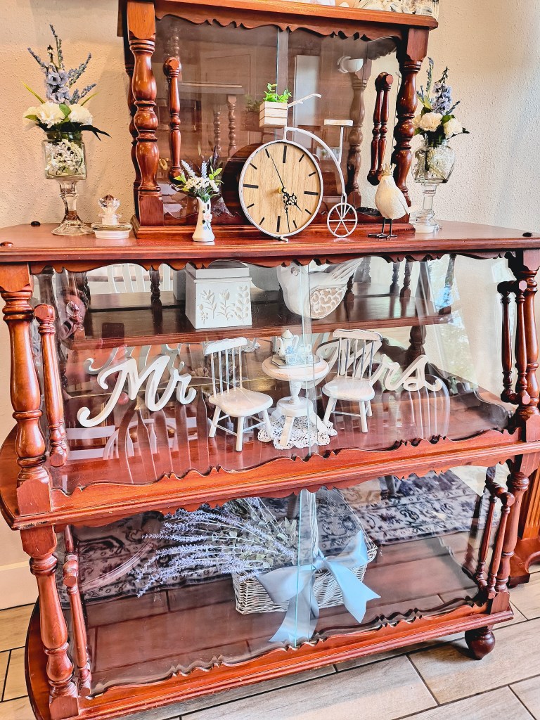 Mahogany antique hand made curio cabinet.
acrossthelake.blog
