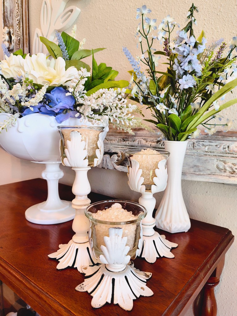 Aroma beads displayed in antique style white metal candle holders.
acrossthelake.blog