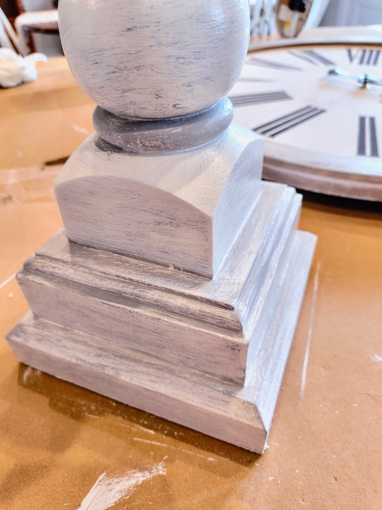 Closeup wooden candlestick holder base.  Paint project makeover.
acrossthelake.blog