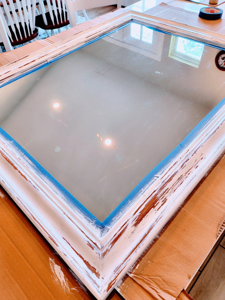 Distressed/chipped paint effect on a vintage mirror.
acrossthelake.blog