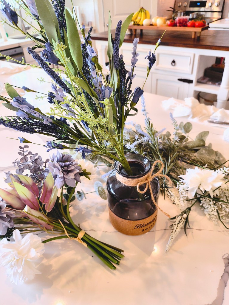 Faux floral arranging mess in kitchen.
acrossthelake.blog