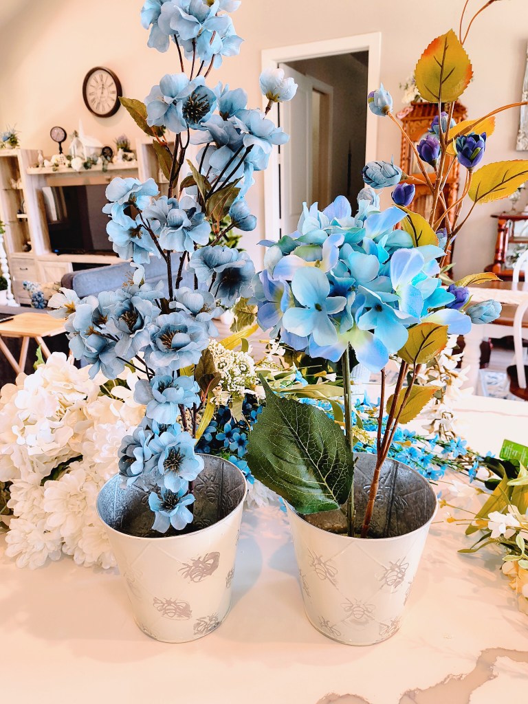 Making faux floral arrangements in blue.
acrossthelake.blog